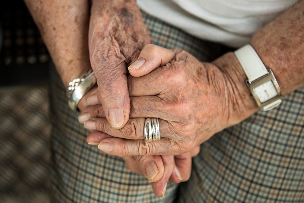 Couple holding hands