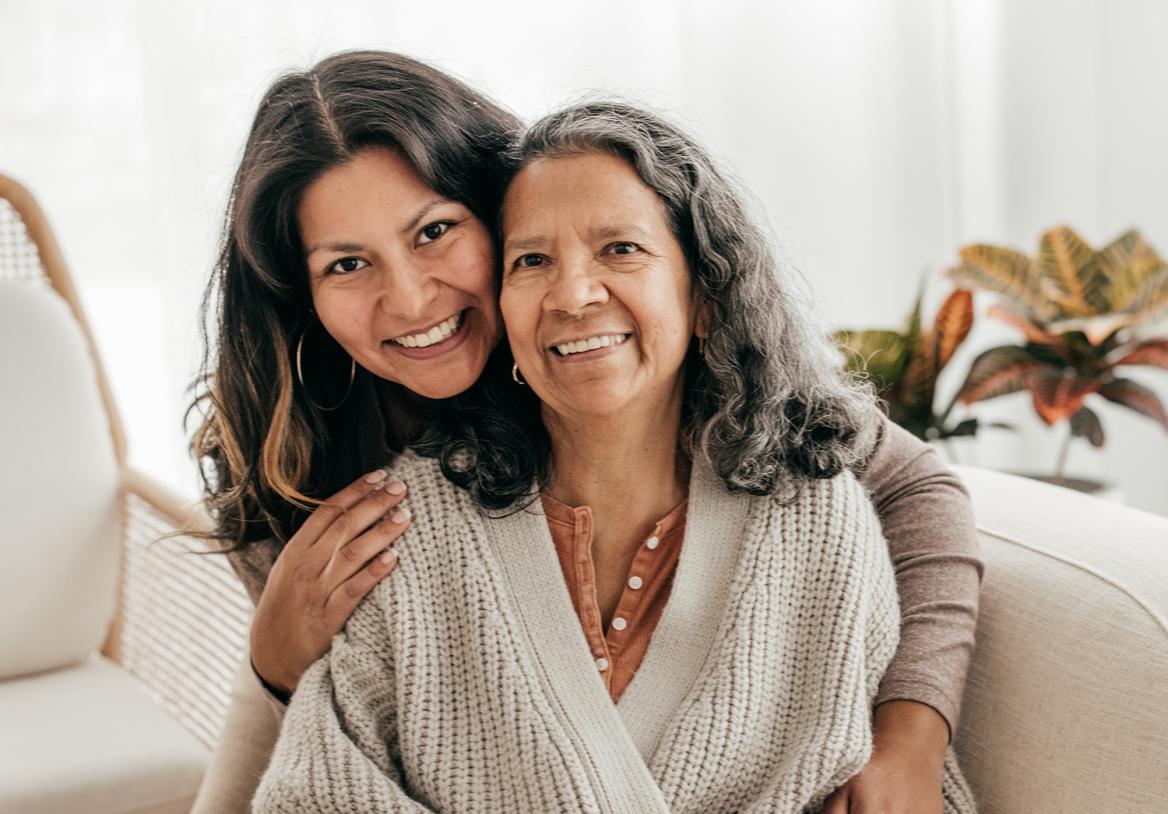 A Younger Woman Holding an Older Woman.