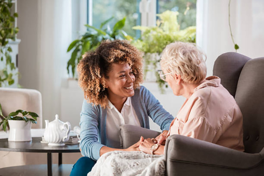 Black woman with an older white woman.