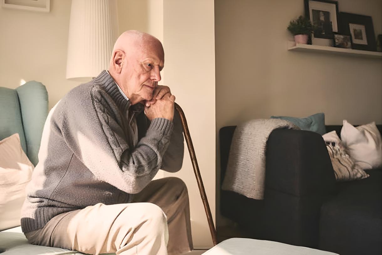 older white man with cane