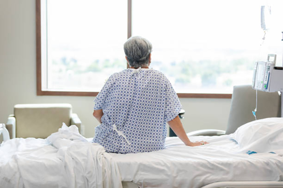 older woman in hospital bed