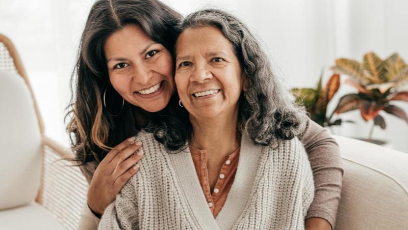 A Younger Woman Holding an Older Woman.