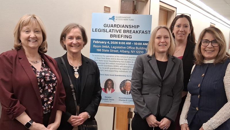 A group of women smiling.