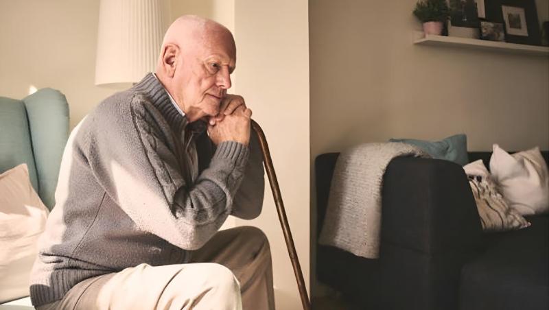 older white man with cane